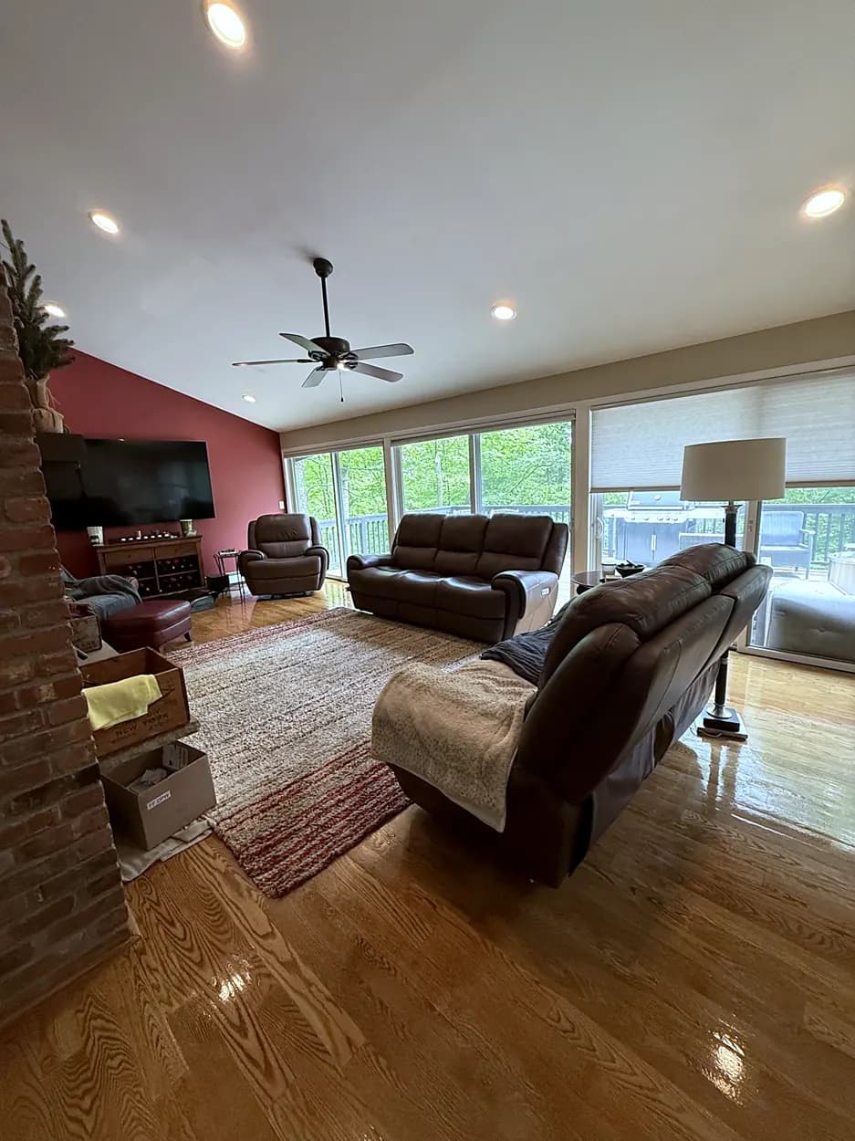 Living room (vaulted ceiling, hardwood floor) after a home cleaning in Montville, NJ